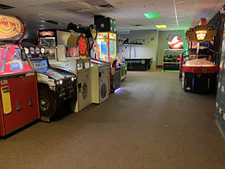 Melody Gardens Skateland game machines including Wonder Wheel and Toy Taxi claw